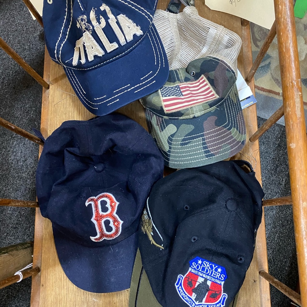Multiple baseball hats